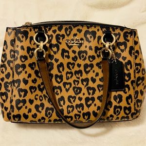 Unique Coach crossbody / shoulder bag with animal print pattern on coated canvas